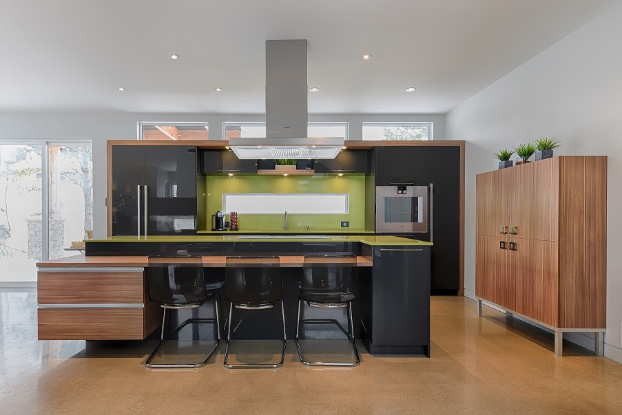 Modern kitchen with green quartz counter top